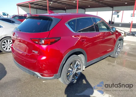 2021 Mazda Cx-5 Signature z USA, uszkodzony, nr VIN JM3KFBEY4M0400545